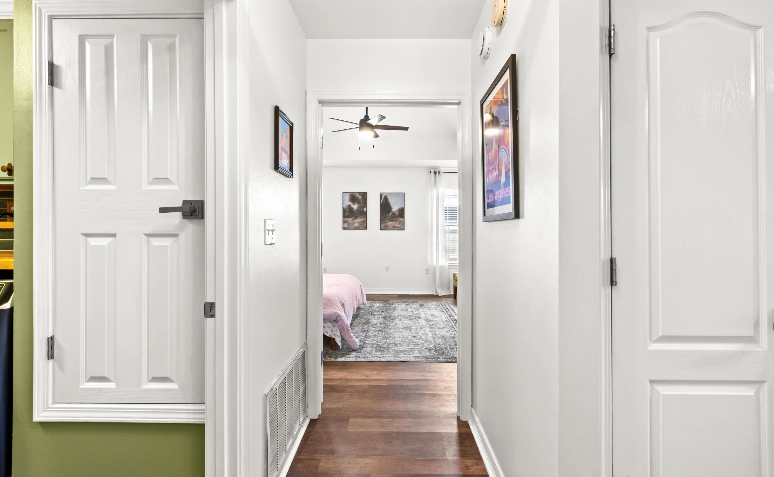 380 Sonora Road Destin, FL 32541 - Photo 26 of 62 a view of a hallway with closet and wooden floor