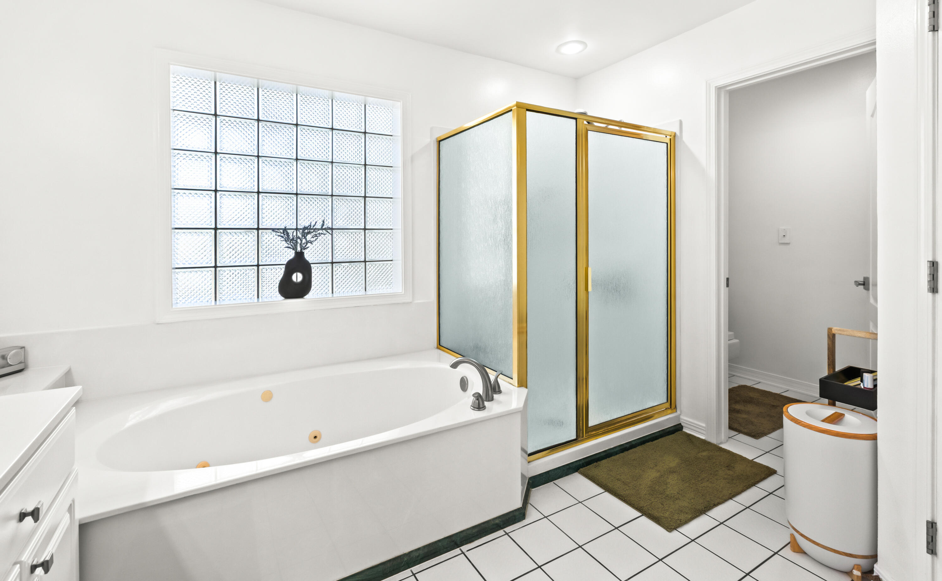 380 Sonora Road Destin, FL 32541 - Photo 36 of 62 a bathroom with a bathtub and a shower