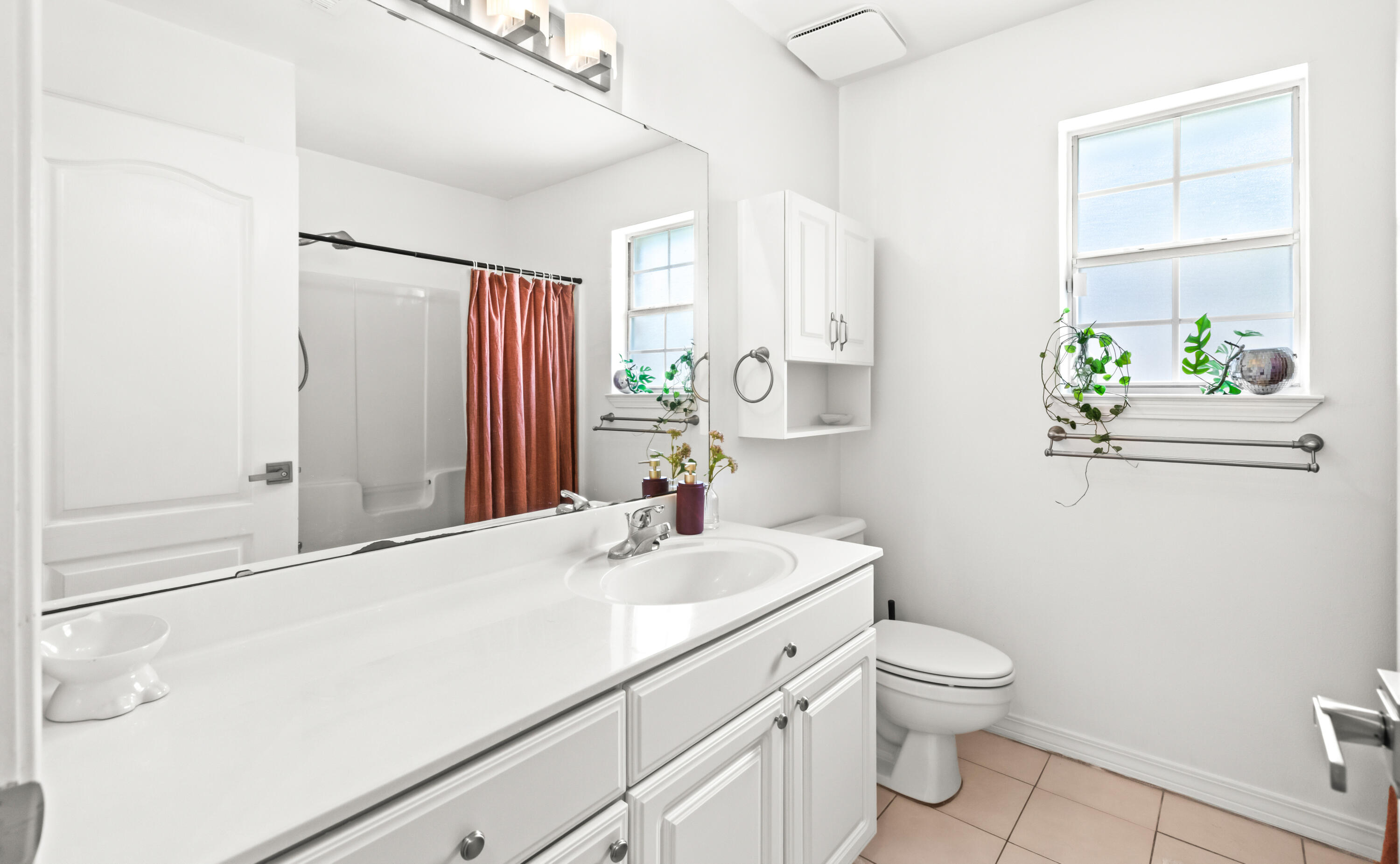 380 Sonora Road Destin, FL 32541 - Photo 43 of 62 a bathroom with a sink a toilet and shower