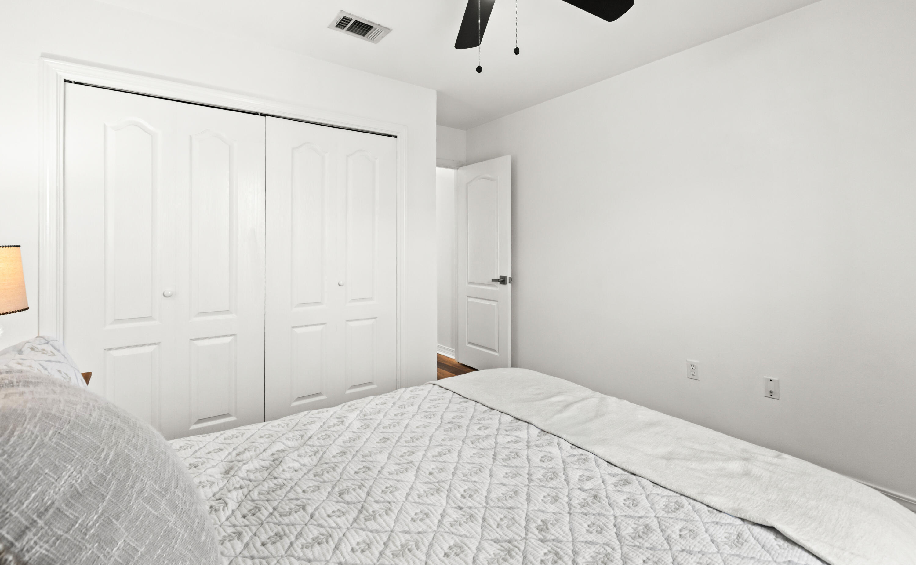 380 Sonora Road Destin, FL 32541 - Photo 48 of 62 a bedroom with a white bed and a shower