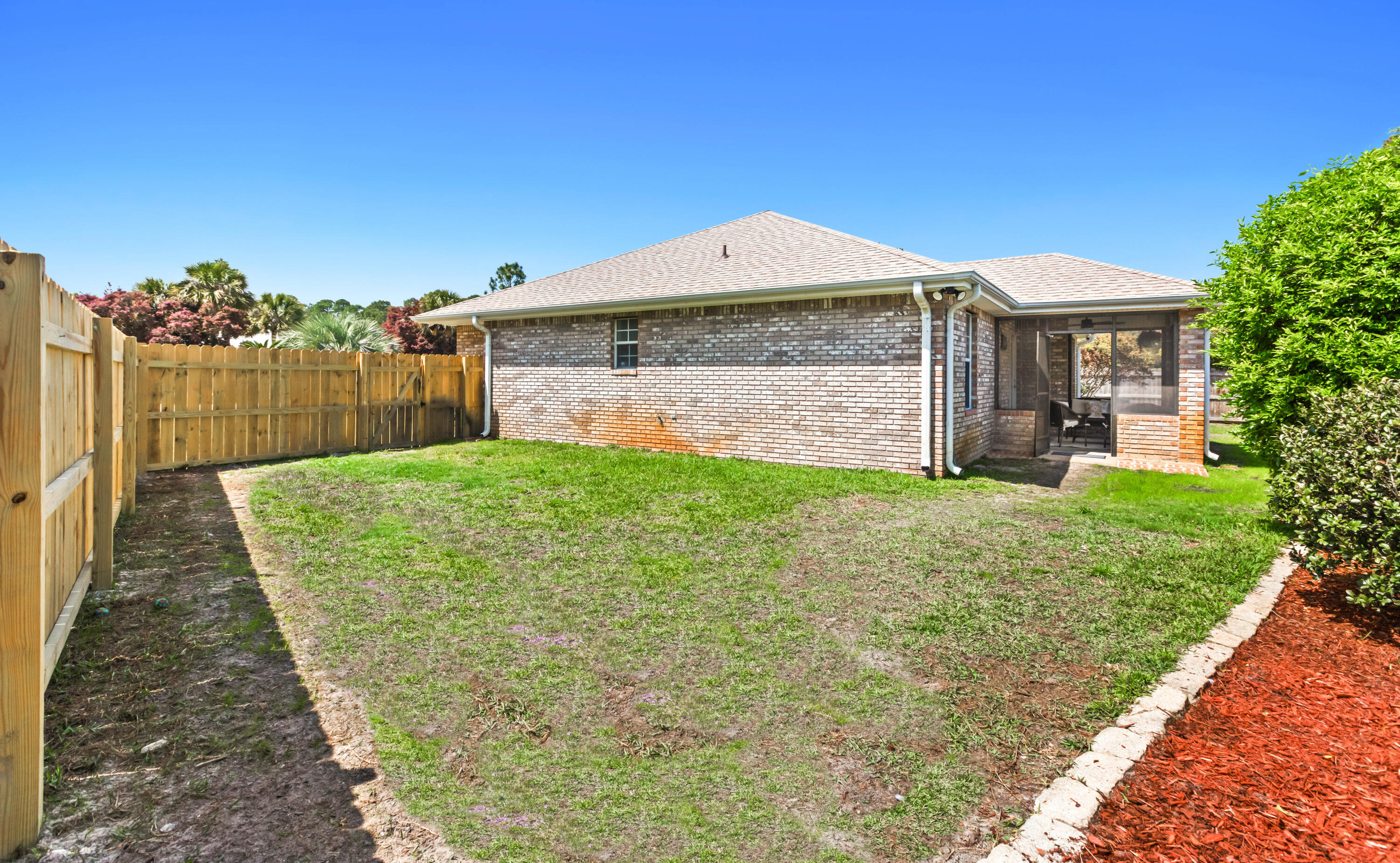 380 Sonora Road Destin, FL 32541 - Photo 53 of 62 a view of a house with a yard