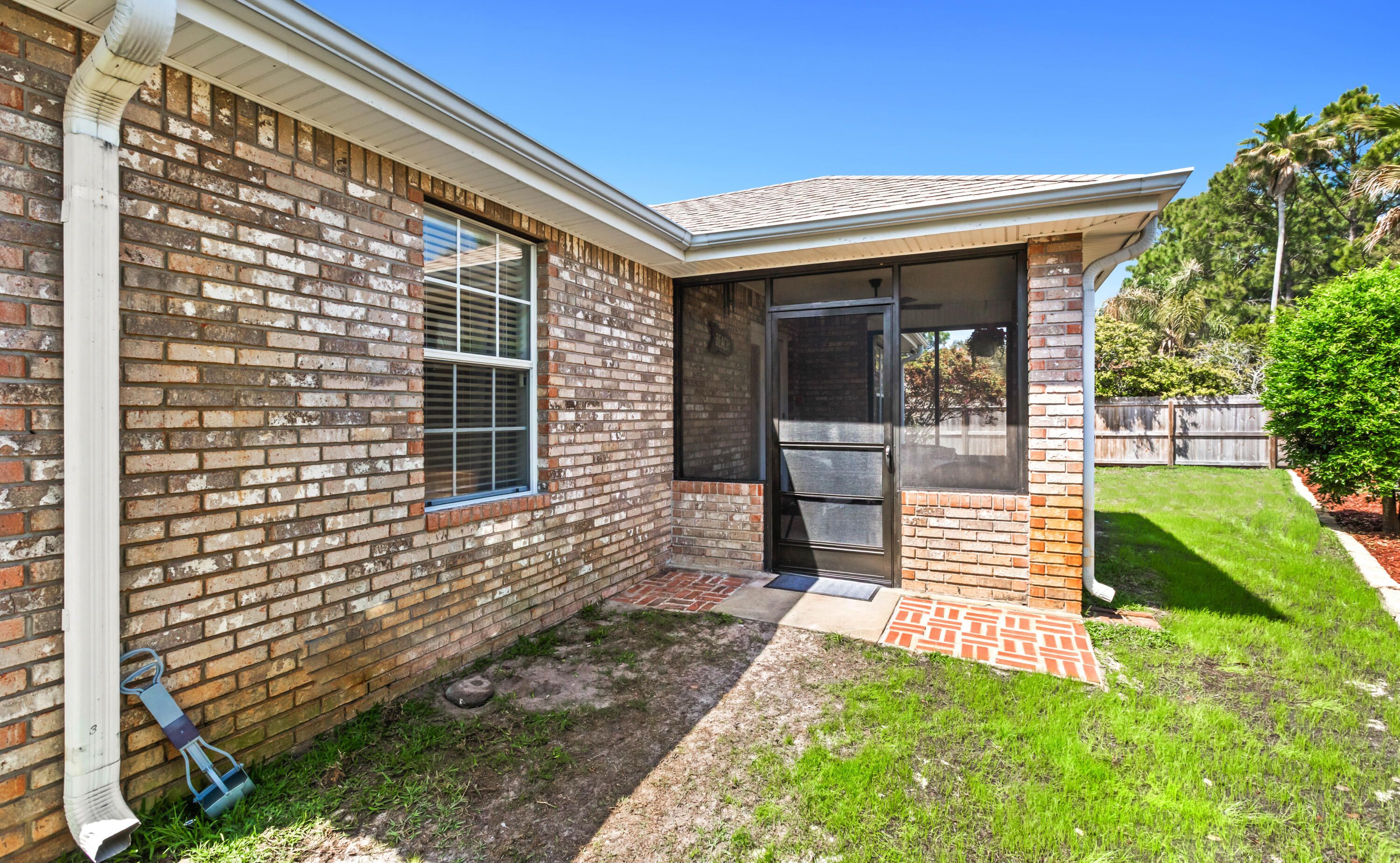 380 Sonora Road Destin, FL 32541 - Photo 55 of 62 a front view of a house with a yard