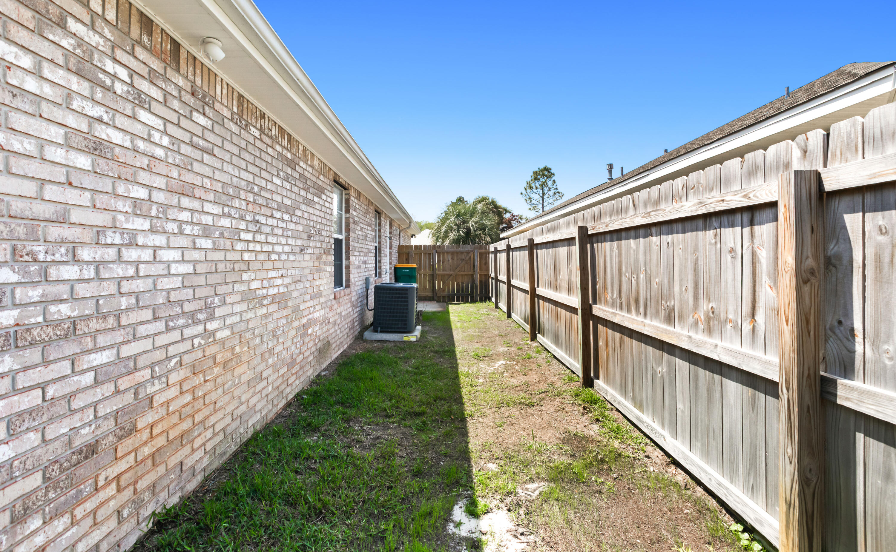 380 Sonora Road Destin, FL 32541 - Photo 60 of 62 a view of a pathway with a wooden stairs