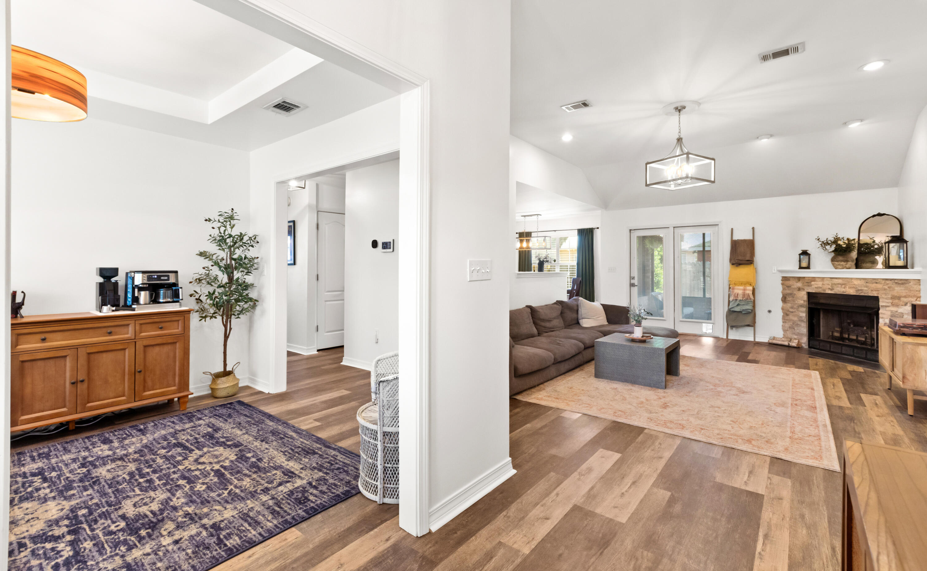 380 Sonora Road Destin, FL 32541 - Photo 7 of 62 a living room with furniture and a fireplace