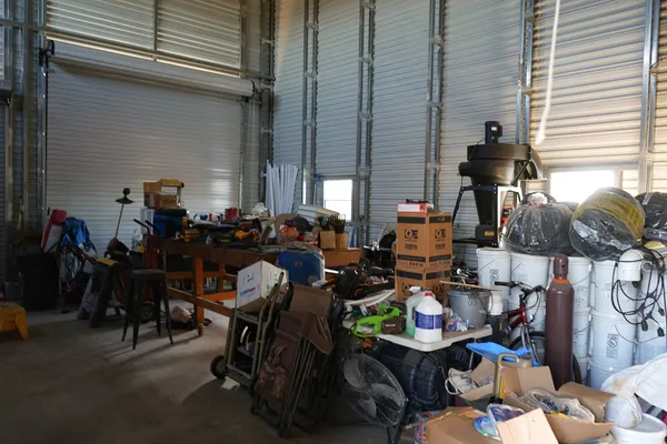 a white toilet sitting next to a small sink