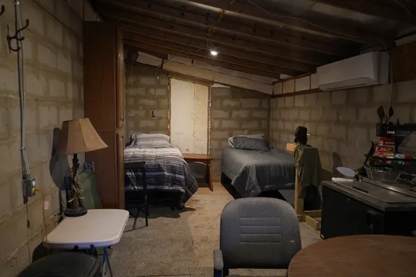 a view of a yard with large trees