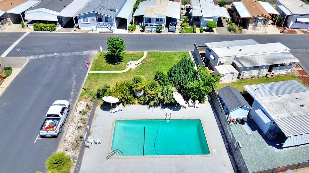 3506 Homestead Way Ceres, CA 95307 - Photo 38 of 39 an aerial view of a house with a swimming pool