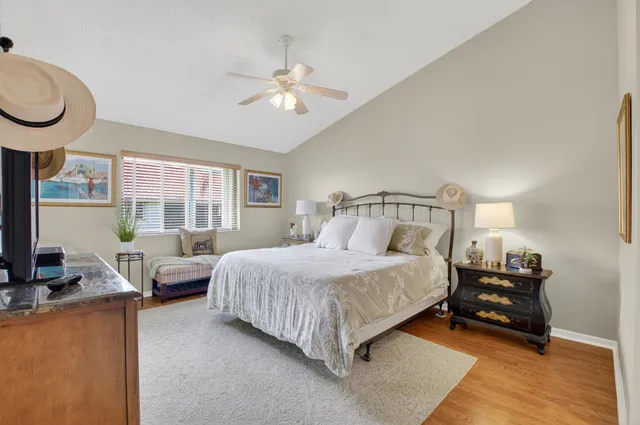 a bedroom with bed and window