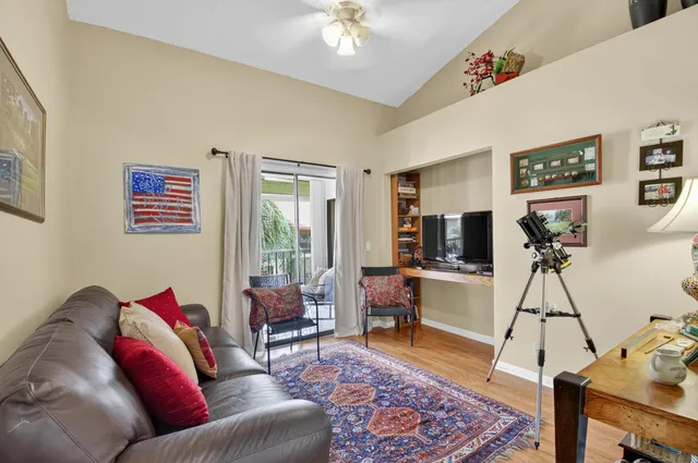a view of a balcony with chairs
