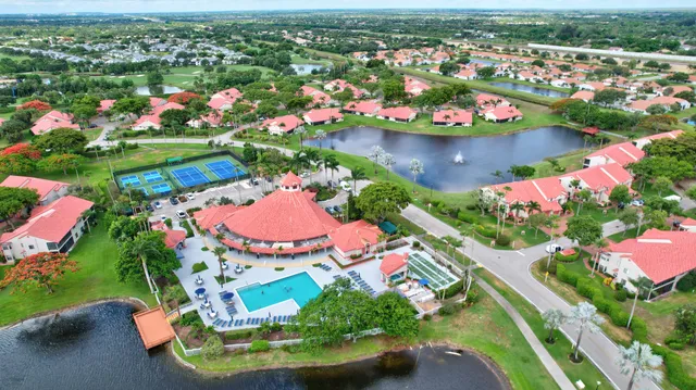 a room with gym equipment and large mirror