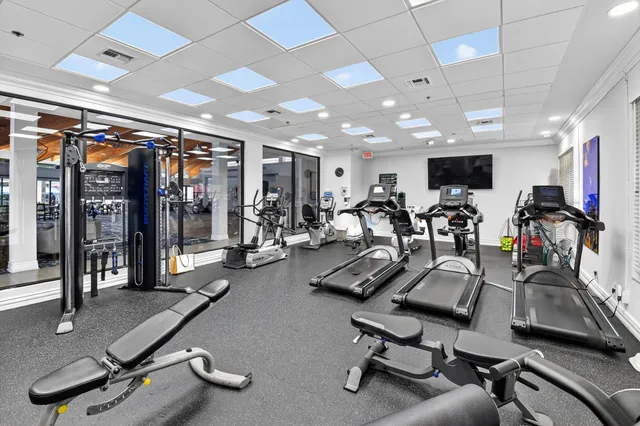 a view of living room with furniture and a window
