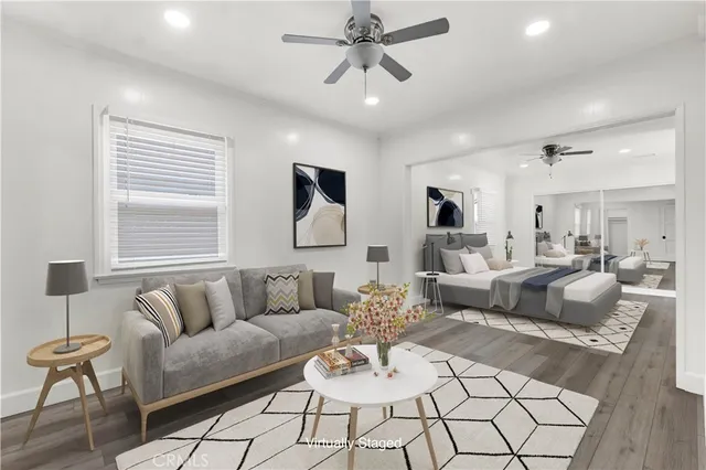 a living room with furniture or couch and a window