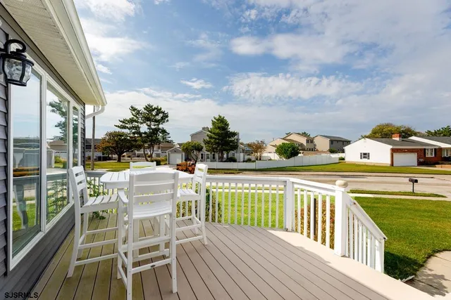 a view of balcony with furniture