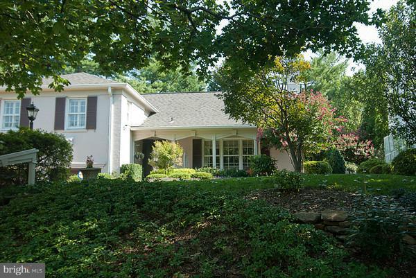 4717 River Road Bethesda, MD 20816 - Photo 1 of 27 Lighted flagstone walk, stone retaining walls