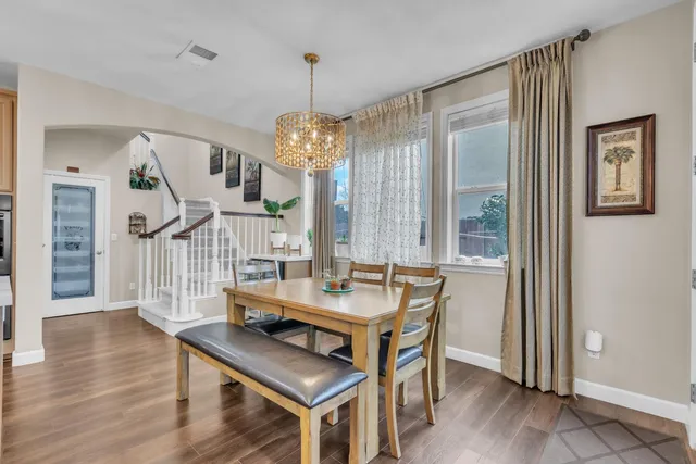 a view of a livingroom with furniture and wooden floor