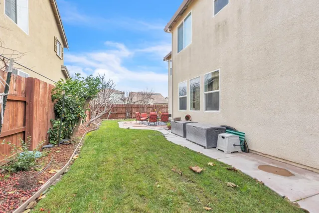 a house view with a garden space