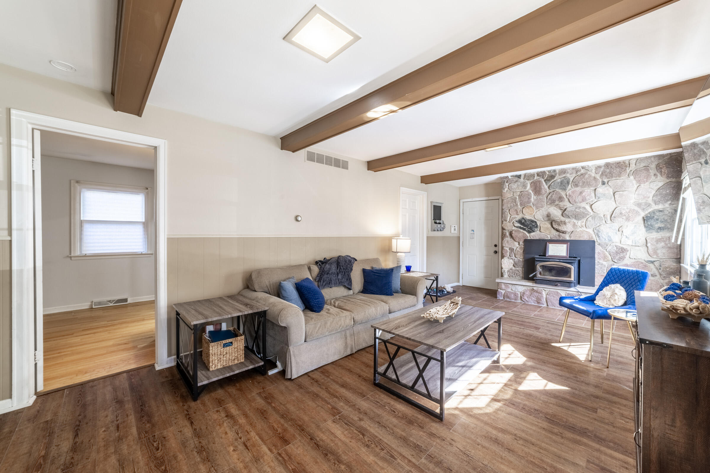 1704 Clover Lane Valparaiso, IN 46385 - Photo 17 of 40 a living room with fireplace furniture and a large window