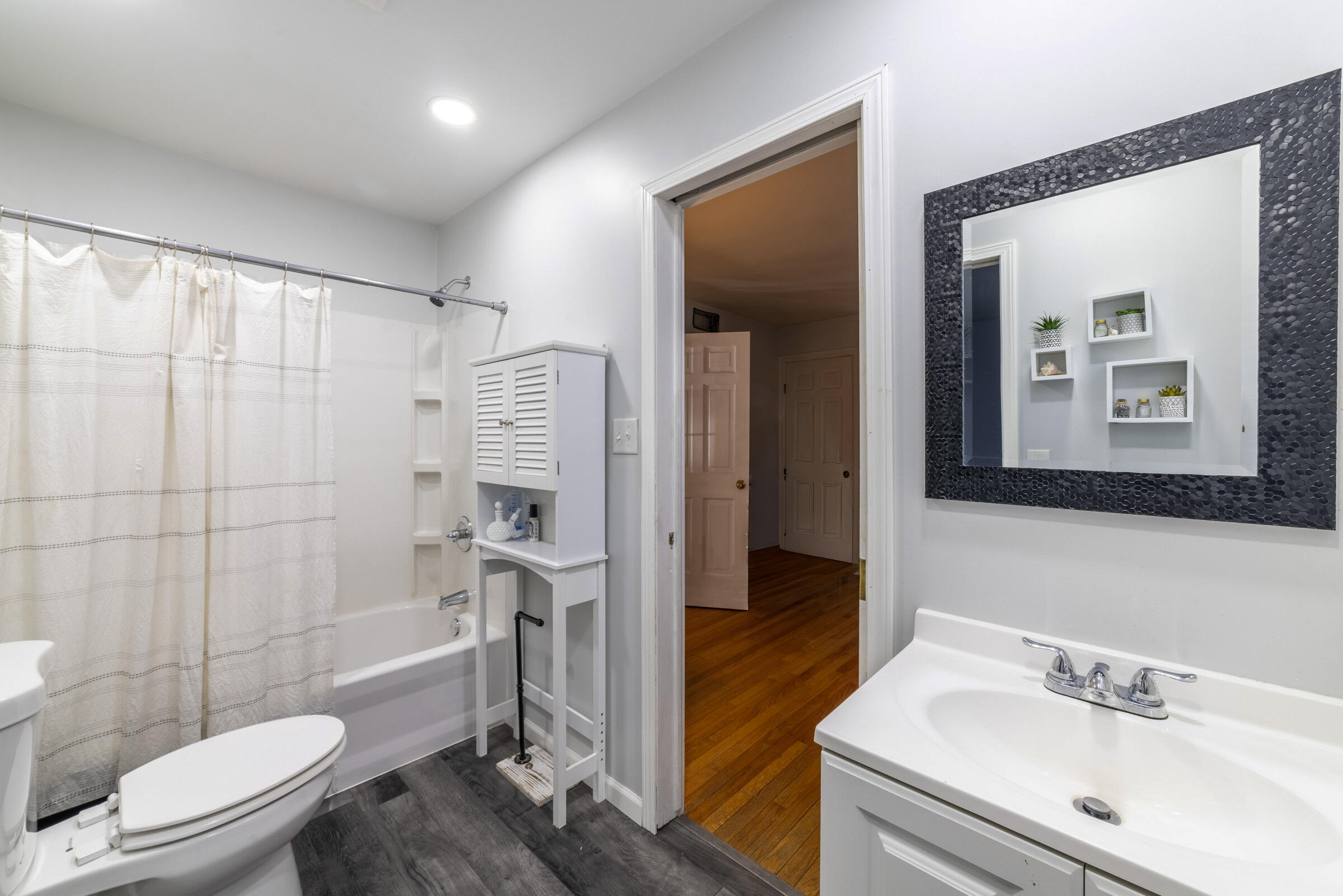 1704 Clover Lane Valparaiso, IN 46385 - Photo 20 of 40 a bathroom with a sink toilet and shower