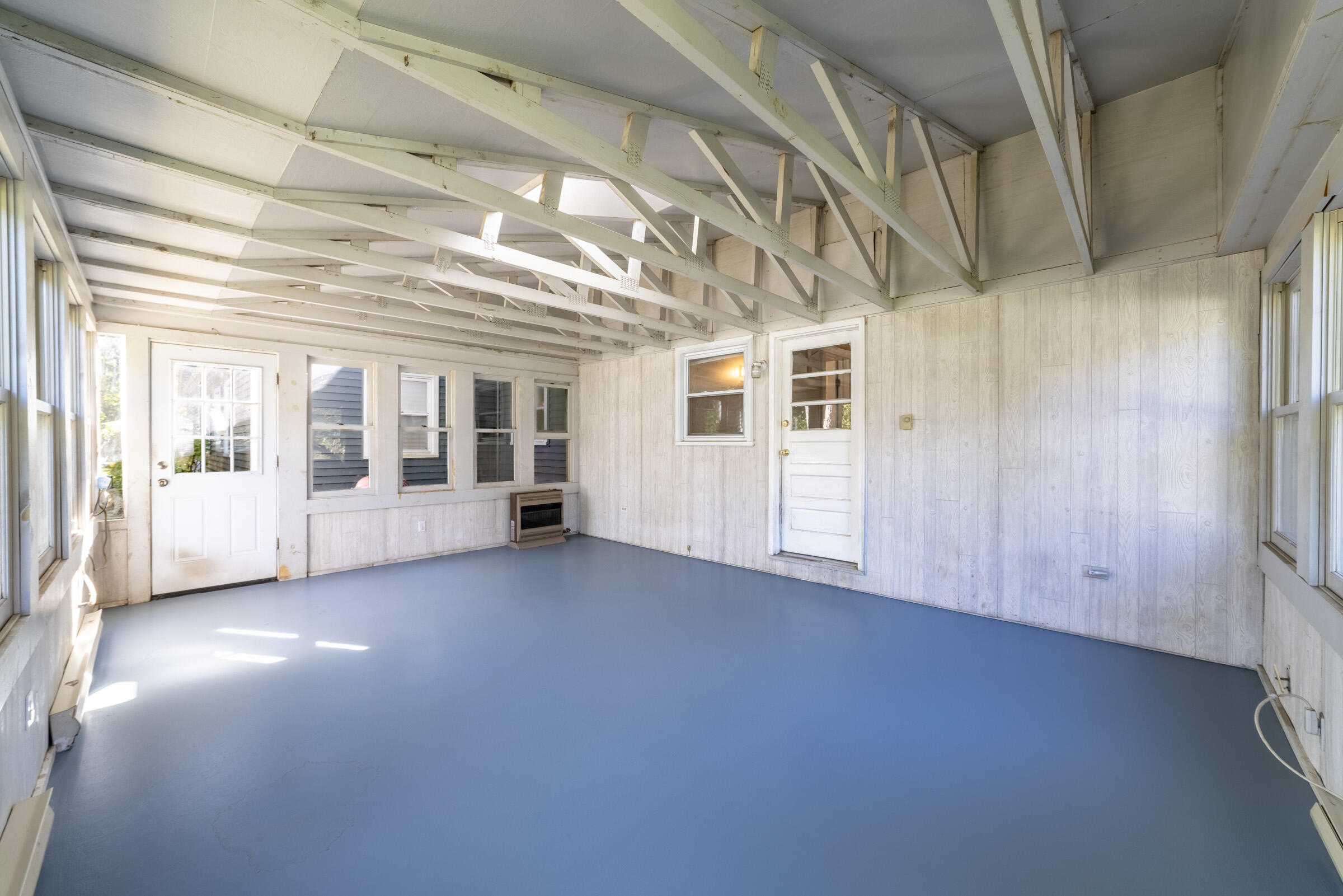 1704 Clover Lane Valparaiso, IN 46385 - Photo 33 of 40 a view of a big room with windows