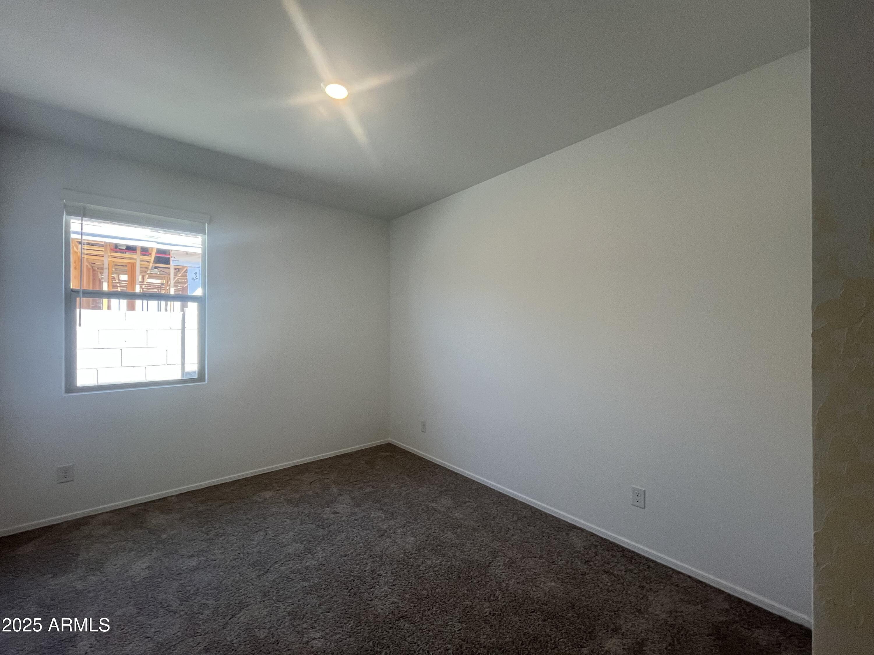 47692 West Moeller Road Maricopa, AZ 85139 - Photo 12 of 31 an empty room with a window
