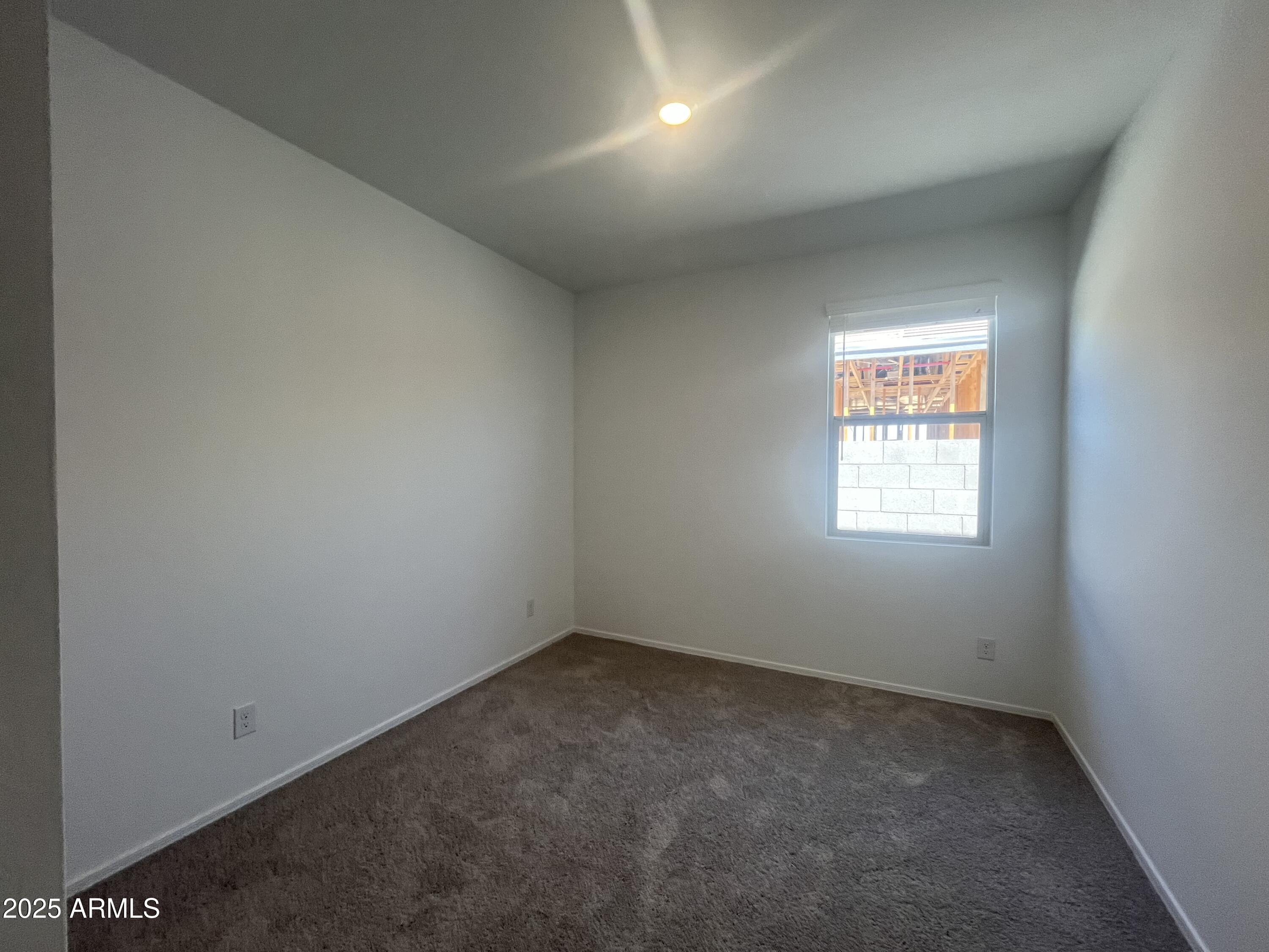47692 West Moeller Road Maricopa, AZ 85139 - Photo 14 of 31 an empty room with a window