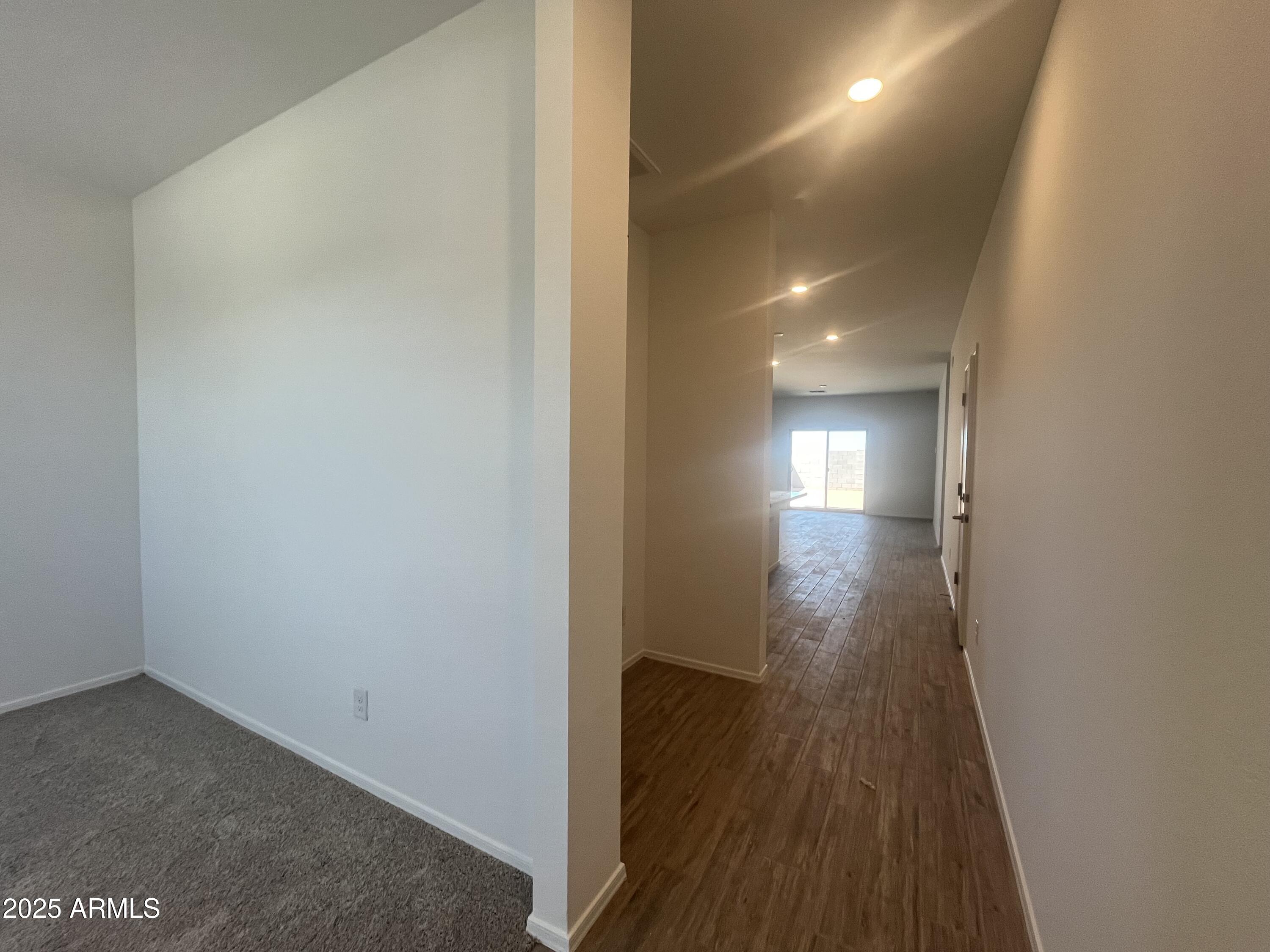 47692 West Moeller Road Maricopa, AZ 85139 - Photo 3 of 31 a view of hallway with wooden floor