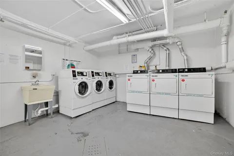 a utility room with washer and dryer