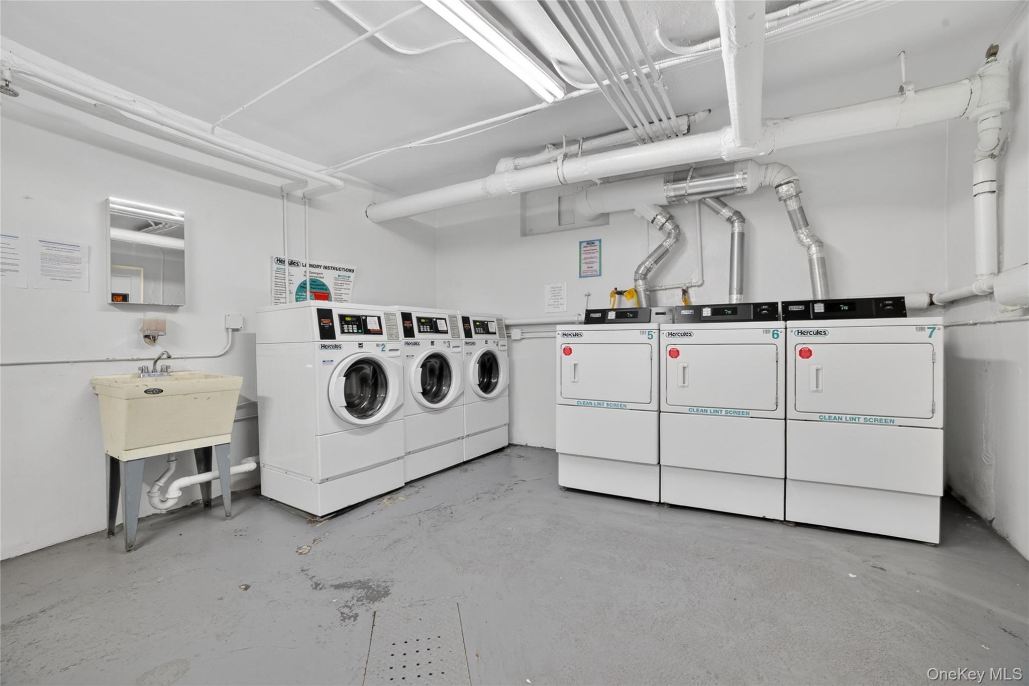 824 Palmer Road, Unit 1F Bronxville, NY 10708 - Photo 21 of 26 a utility room with washer and dryer