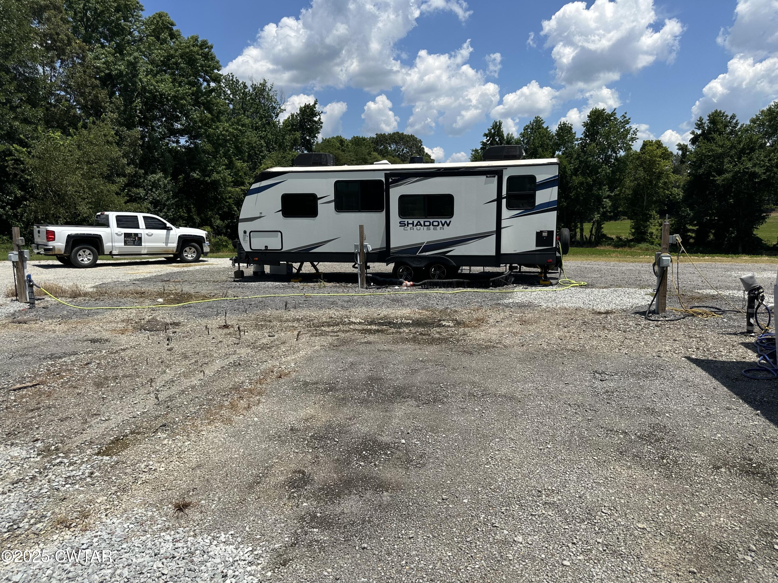 1636 Windrow Road Brownsville, TN 38012 - Photo 3 of 12 a view of a house with backyard