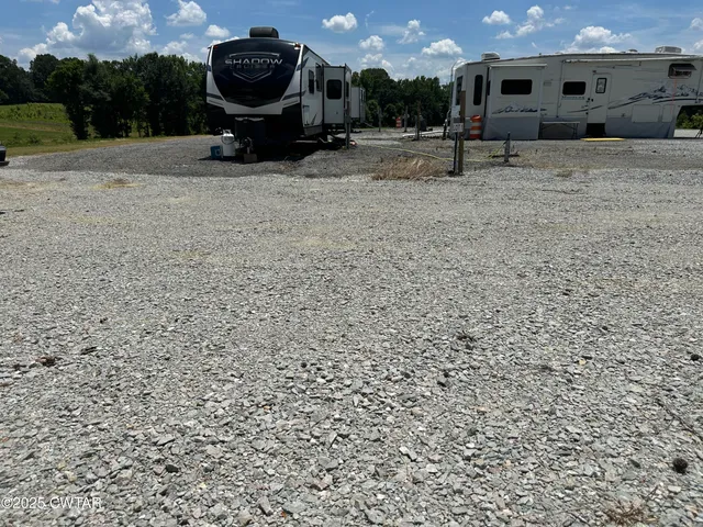 a sign broad on a brick wall
