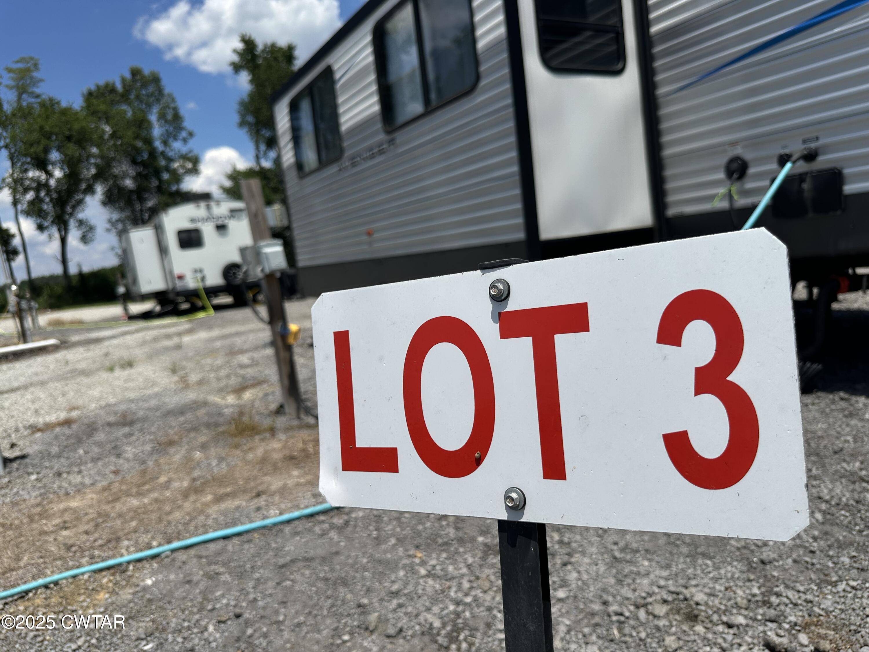 1636 Windrow Road Brownsville, TN 38012 - Photo 5 of 12 a sign broad on a brick wall