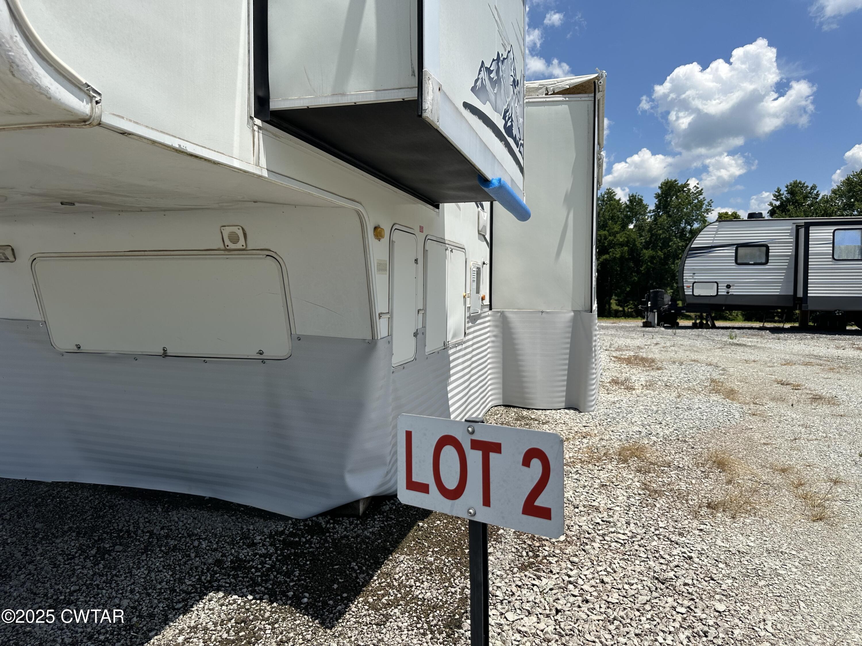 1636 Windrow Road Brownsville, TN 38012 - Photo 6 of 12 a sign that is on the side of the road