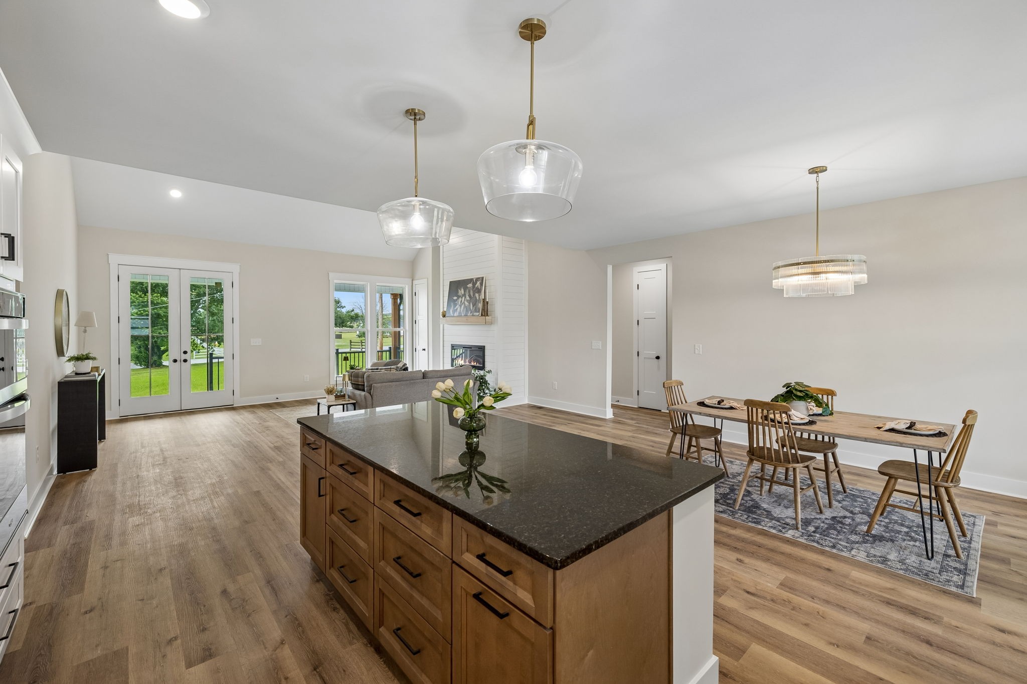 777 Rock Springs Road Castalian Springs, TN 37031 - Photo 16 of 52 a kitchen with center island table and chairs
