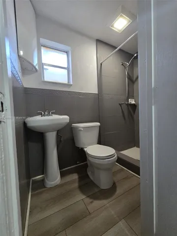 a bathroom with a sink and a toilet