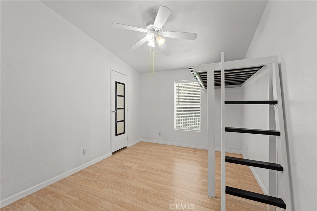 52076 Maxine Avenue Cabazon, CA 92230 - Photo 15 of 35 an empty room with windows and closet