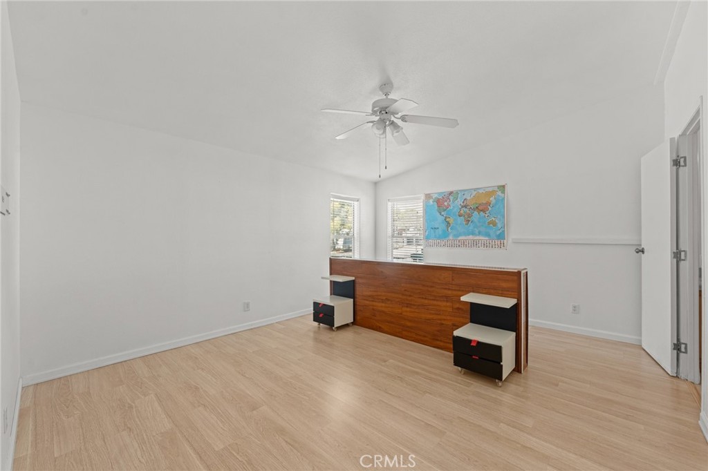 52076 Maxine Avenue Cabazon, CA 92230 - Photo 19 of 35 a view of room with window and wooden floor