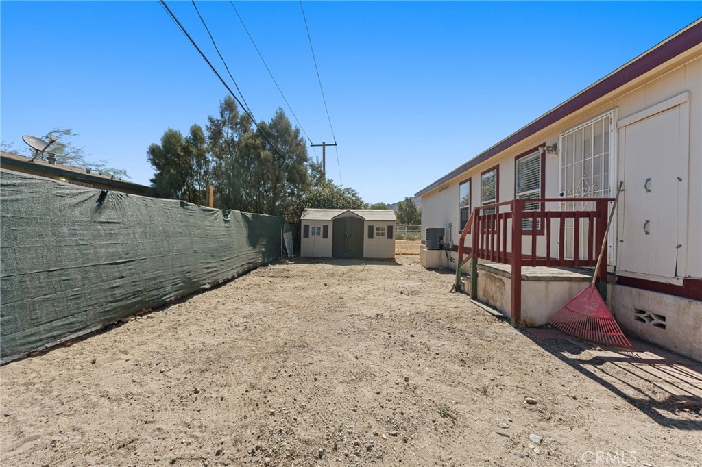 52076 Maxine Avenue Cabazon, CA 92230 - Photo 27 of 35 a view of backyard with deck