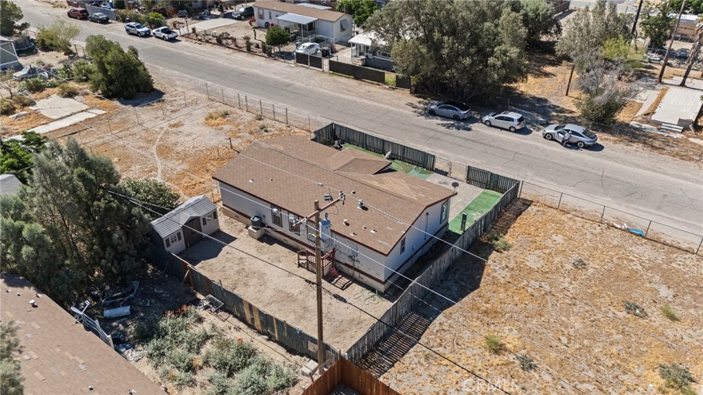 52076 Maxine Avenue Cabazon, CA 92230 - Photo 29 of 35 a view of a house with a yard