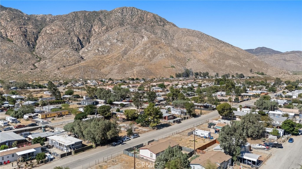 52076 Maxine Avenue Cabazon, CA 92230 - Photo 32 of 35 an aerial view of mountain with residential house