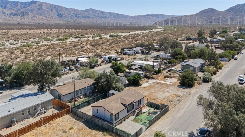 52076 Maxine Avenue Cabazon, CA 92230 - Photo 33 of 35 an aerial view of residential house with outdoor space