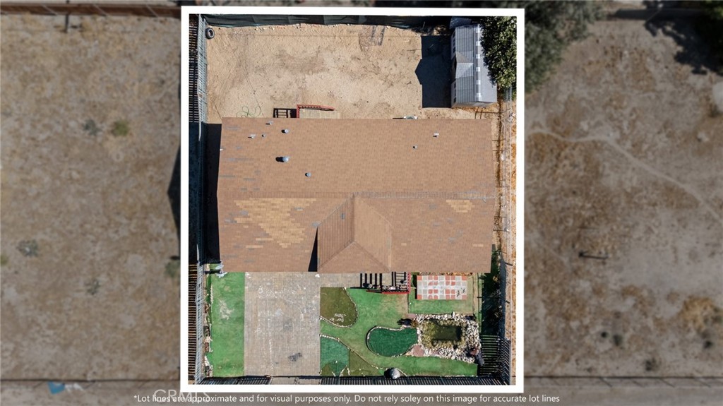 52076 Maxine Avenue Cabazon, CA 92230 - Photo 34 of 35 an aerial view of a house with a backyard space
