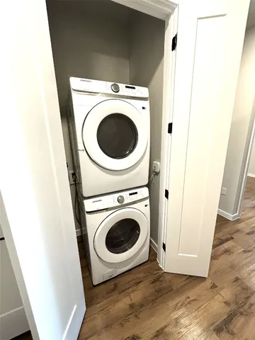 a view of a kitchen from a hallway
