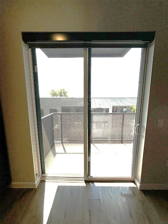 4510 Terry-O Lane, Unit 406 Austin, TX 78745 - Photo 22 of 35 a view of empty room with wooden floor and fan