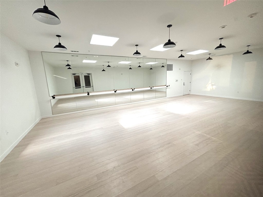 4510 Terry-O Lane, Unit 406 Austin, TX 78745 - Photo 26 of 35 an empty room with kitchen view and a window