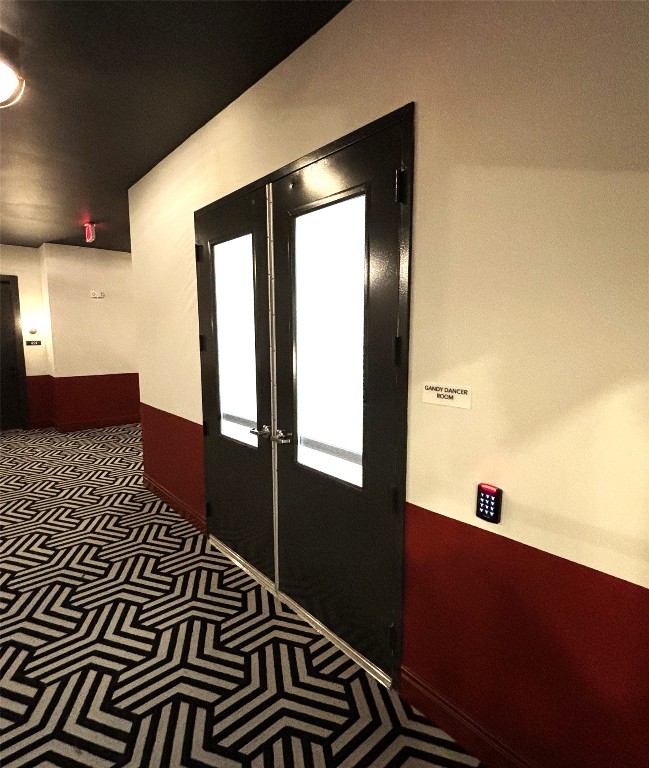 4510 Terry-O Lane, Unit 406 Austin, TX 78745 - Photo 27 of 35 a bedroom with a bed and a mirror