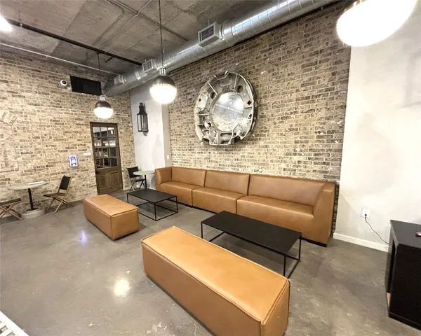 a outdoor space with lots of white furniture