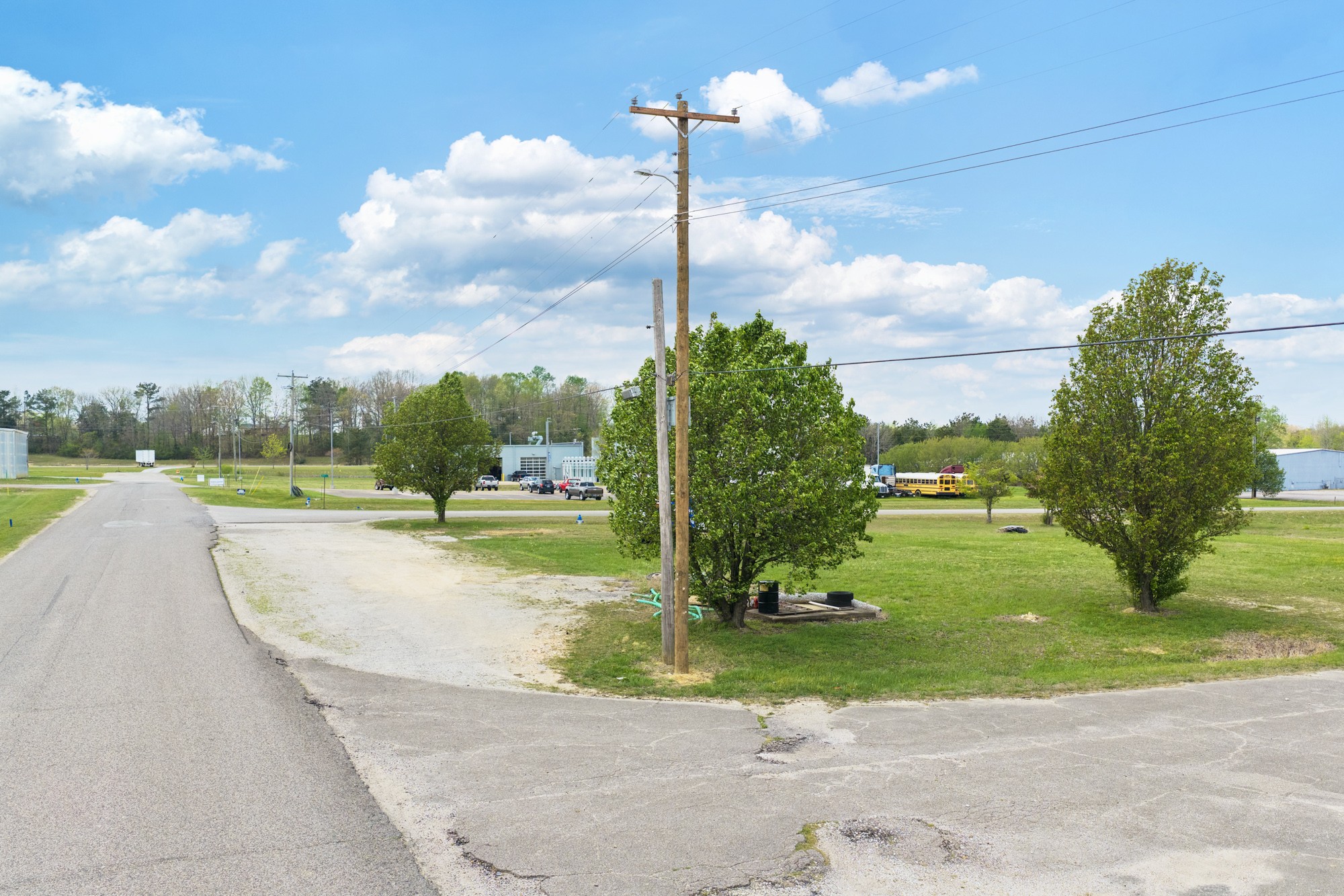 0 West 9th Street Parsons, TN 38363 - Photo 4 of 15 a view of a street with a yard