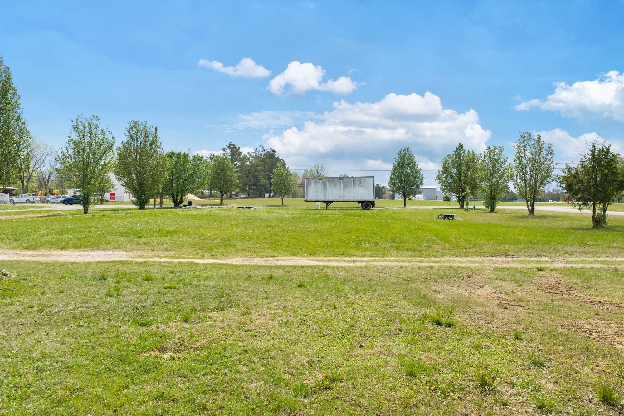 0 West 9th Street Parsons, TN 38363 - Photo 10 of 15 a view of a big yard with a fountain