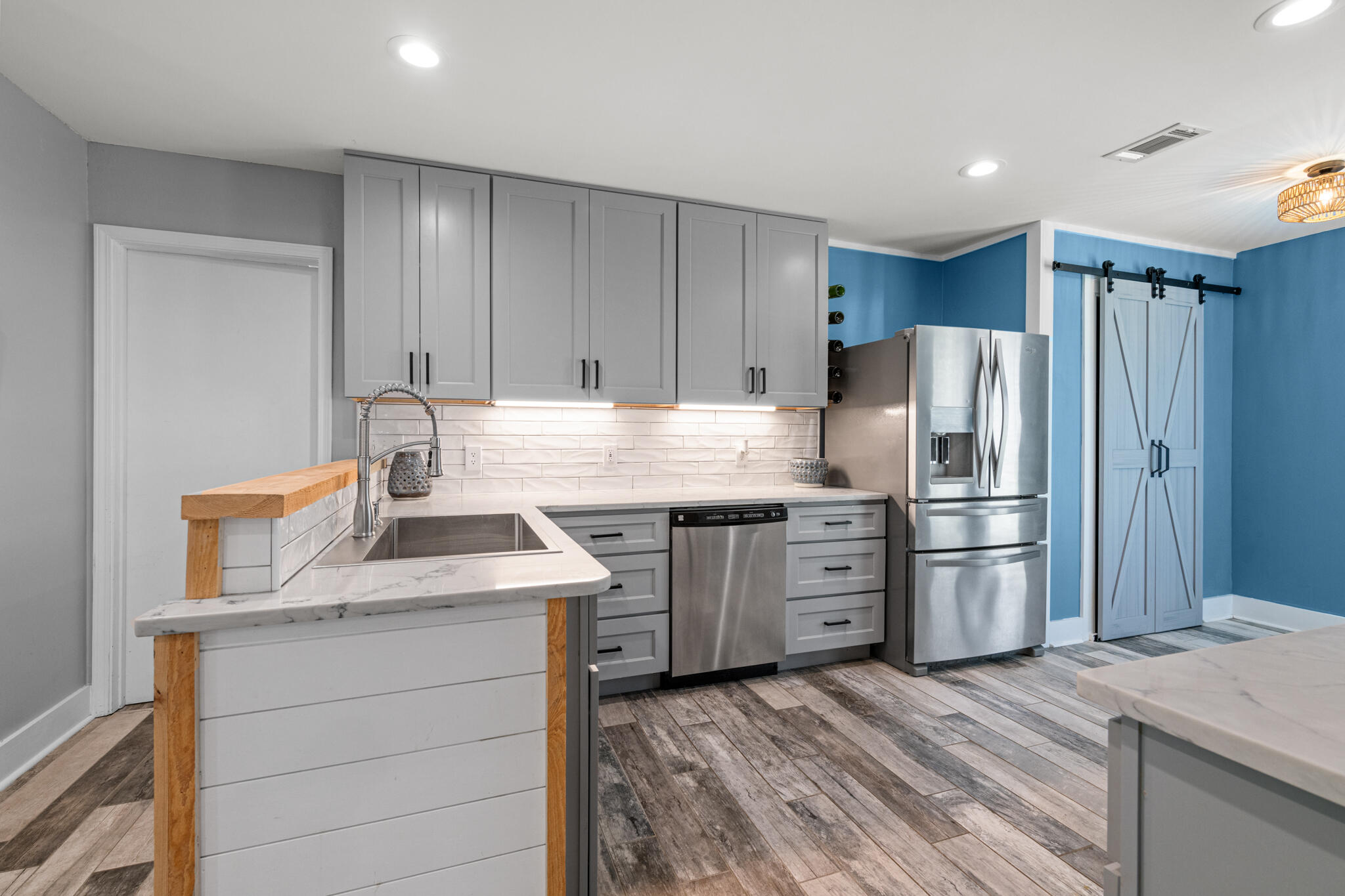 8573 Westview Lane Pensacola, FL 32514 - Photo 18 of 35 a kitchen with a refrigerator stove and sink