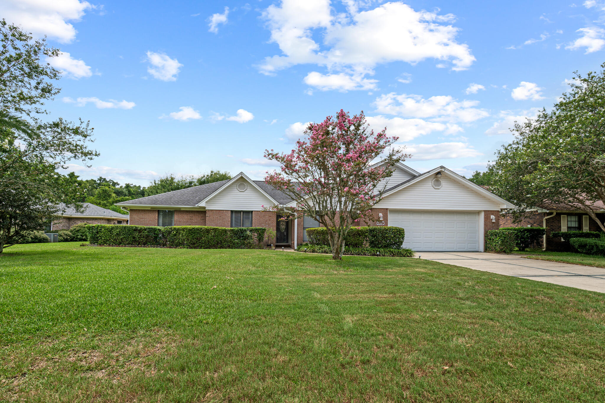 8573 Westview Lane Pensacola, FL 32514 - Photo 2 of 35 a front view of house with yard and green space